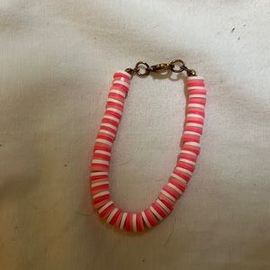 This is a pink clip bracelet